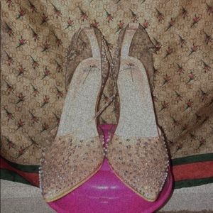 I am selling pretty rhinestone heels they are a size 8